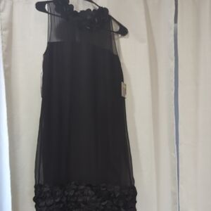 Taylor Elegant Black Sleeveless Dress with Floral Vintage Accents.
